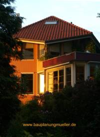 Holzhaus mit Wintergarten